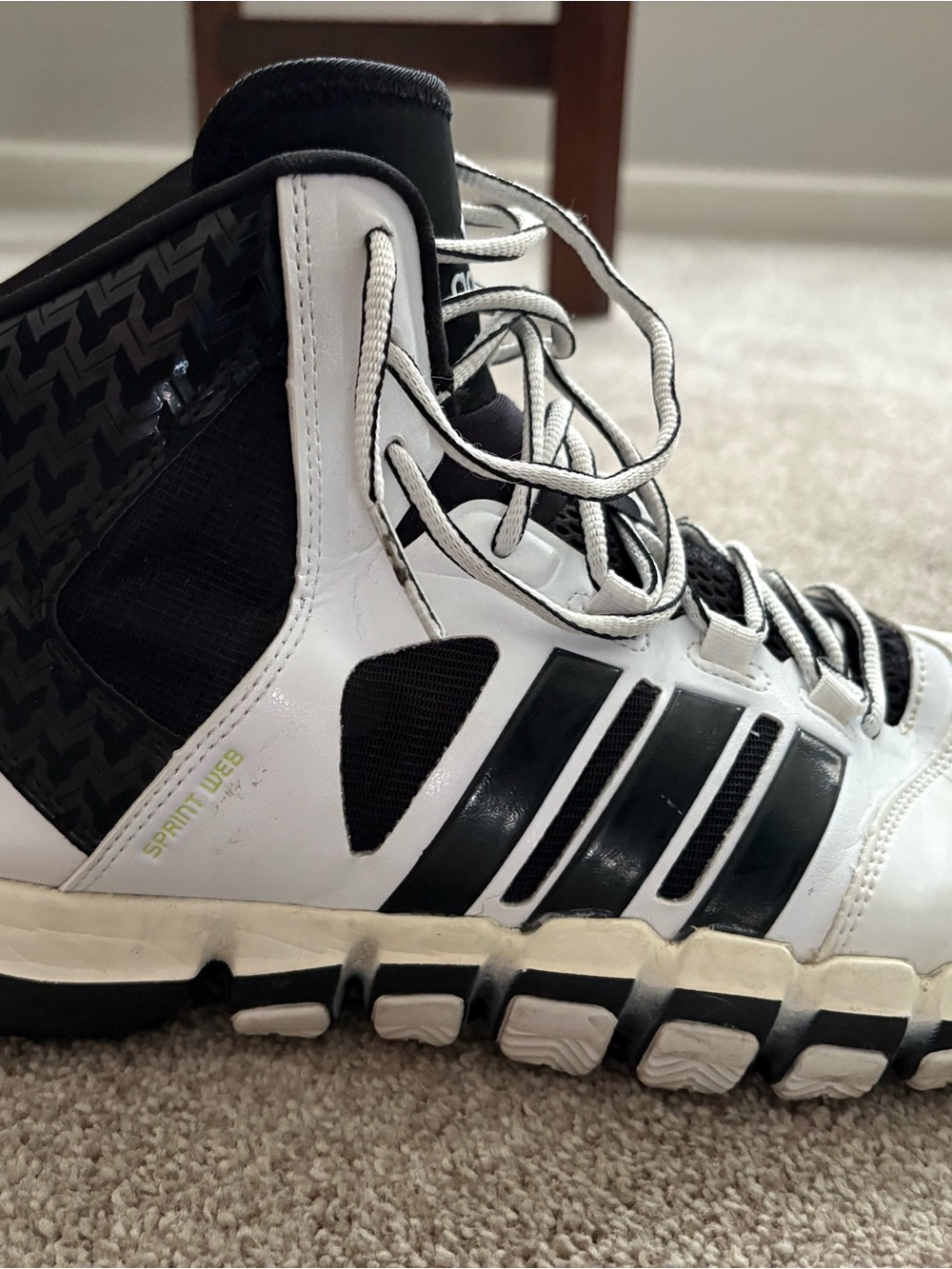 adidas Men’s White and Black High-Top Athletic Sneakers